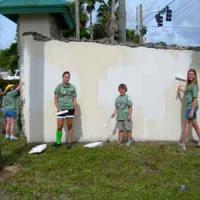 kids painting a wall