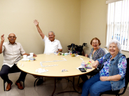 Seniors playing dominoes