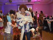 Daddy Daughter Dance Disco theme father wrapped up in toilet paper for mummy game