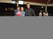 Bicycle raffle winning family with PBSO officer