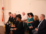 City officials listen in to the Invocation.