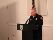 Chief Konz at the podium giving a speech.