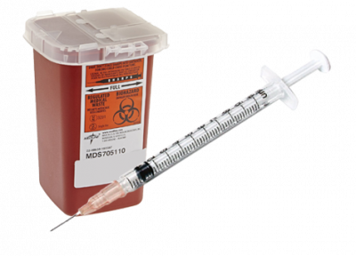 Sharps container with needle 